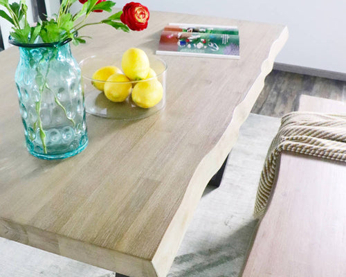 Aspen dining table unites wood and metal tastefully.