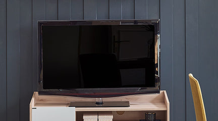 Compact TV Console with lovely wood tone and white doors